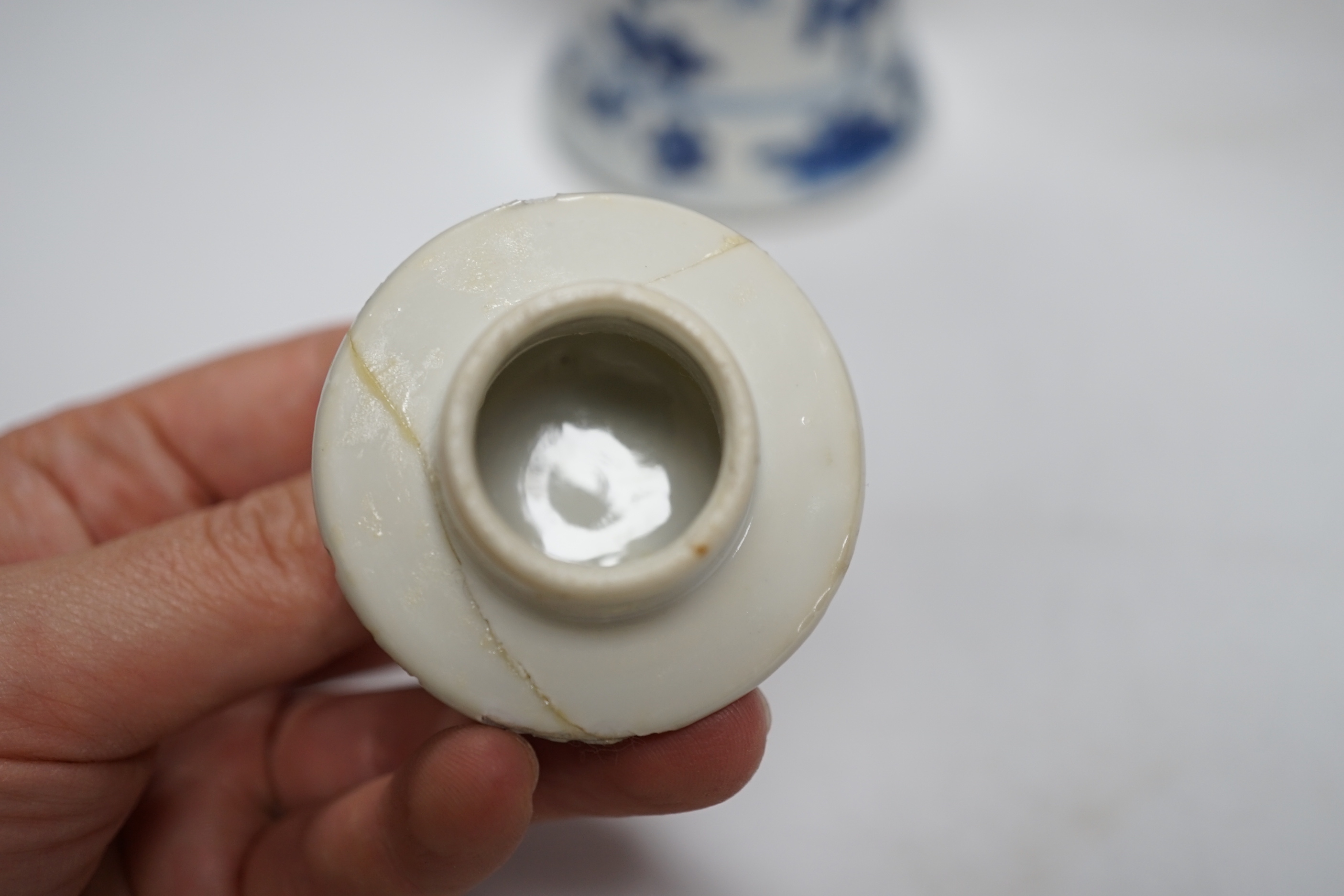 A late 19th century Chinese blue and white twin elephant head handle vase and five other 19th century Chinese blue and white vases, tallest 26cm